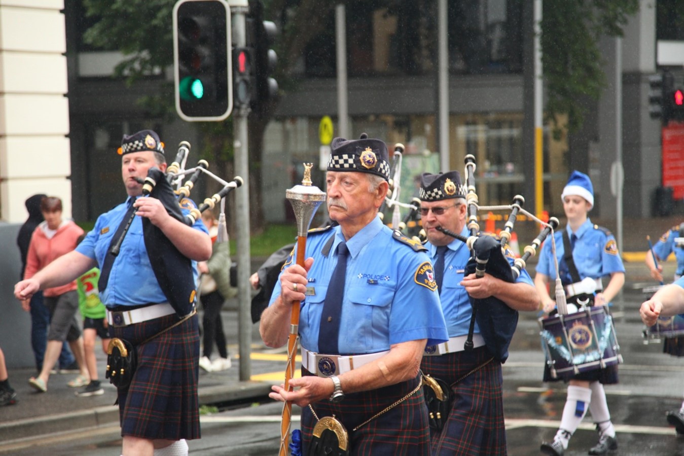 Pipe band parading in the 2024 Hobart Christmas Pageant