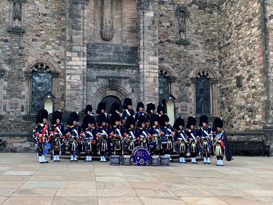 Tasmania Police Pipe Band members in front of Edinburgh Castle, whilst attending the 2019 Royal Edinburgh Military Tattoo